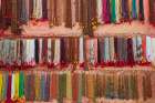 India, Uttar Pradesh, Varanasi, Bangali Tola. Beaded necklaces for sale. Art Print